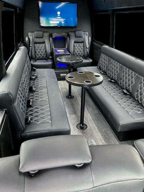 Van in Black Sprinter Limo