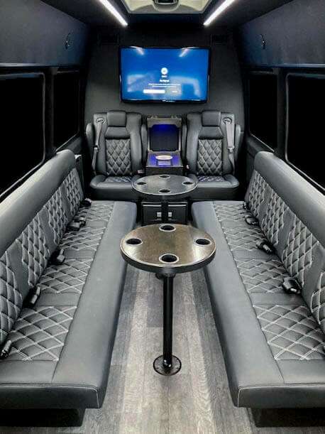 Van in Black Sprinter Limo