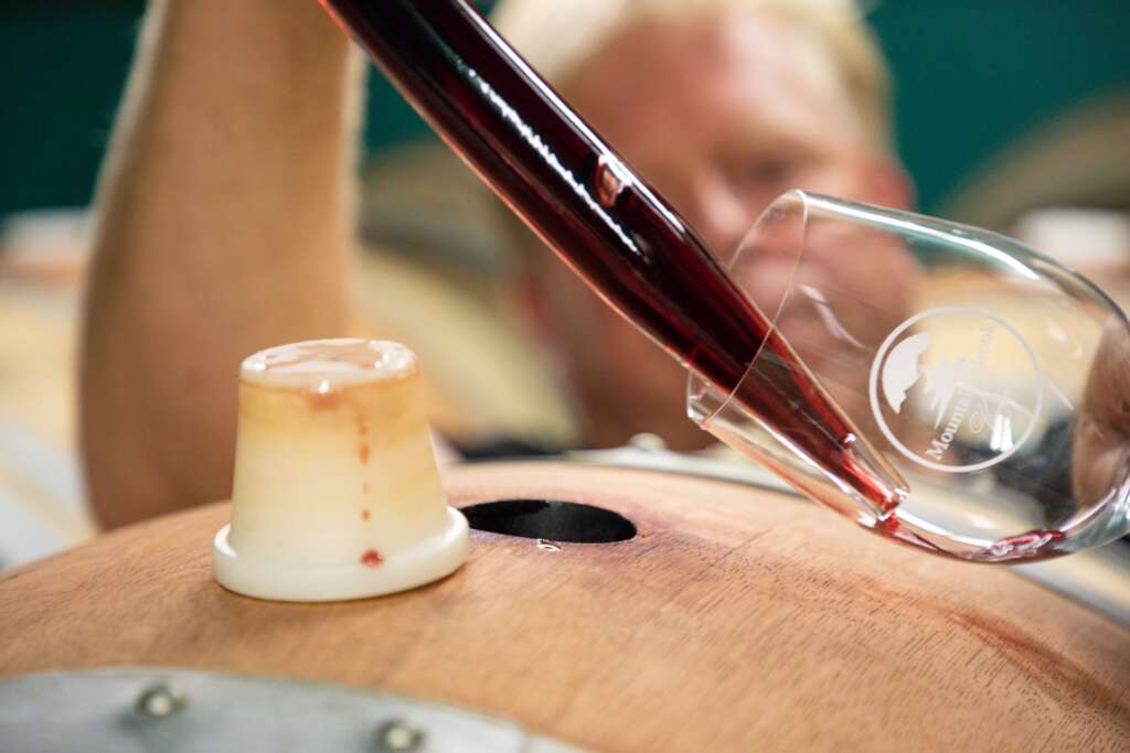 Taking Wine From a Barrel